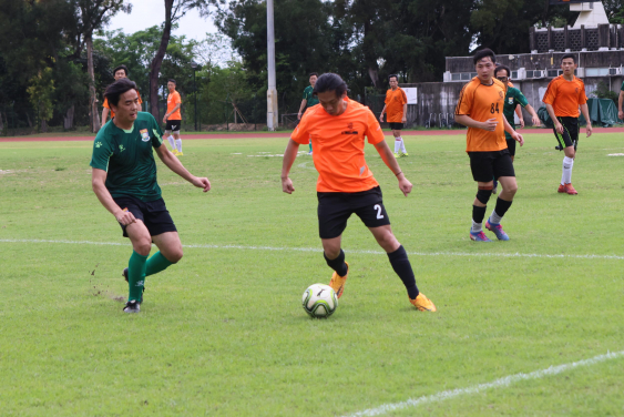 Players from both teams compete hard during the game.